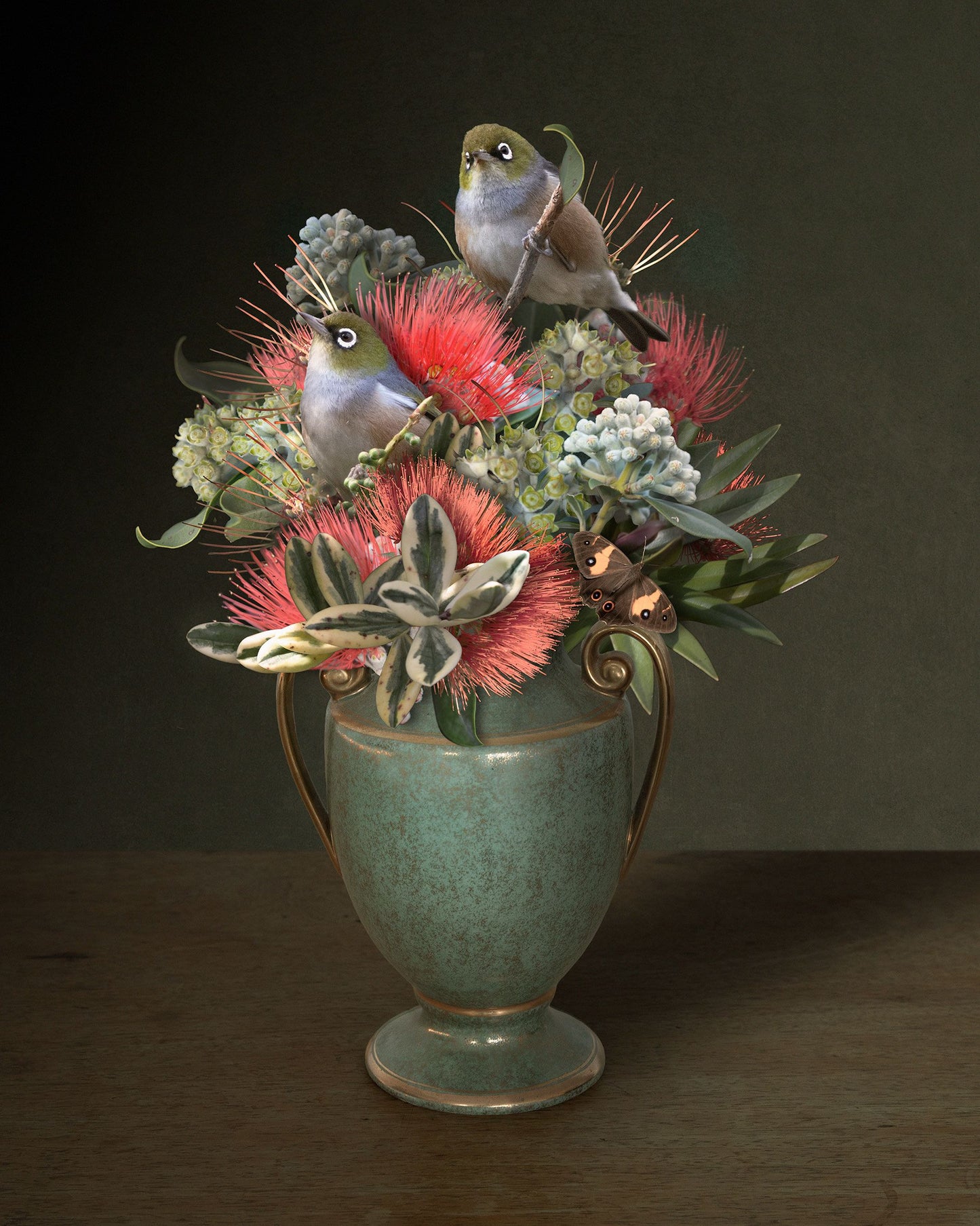 Photographic print featuring a decorative vase with pohutukawa choppings and silvereyes
