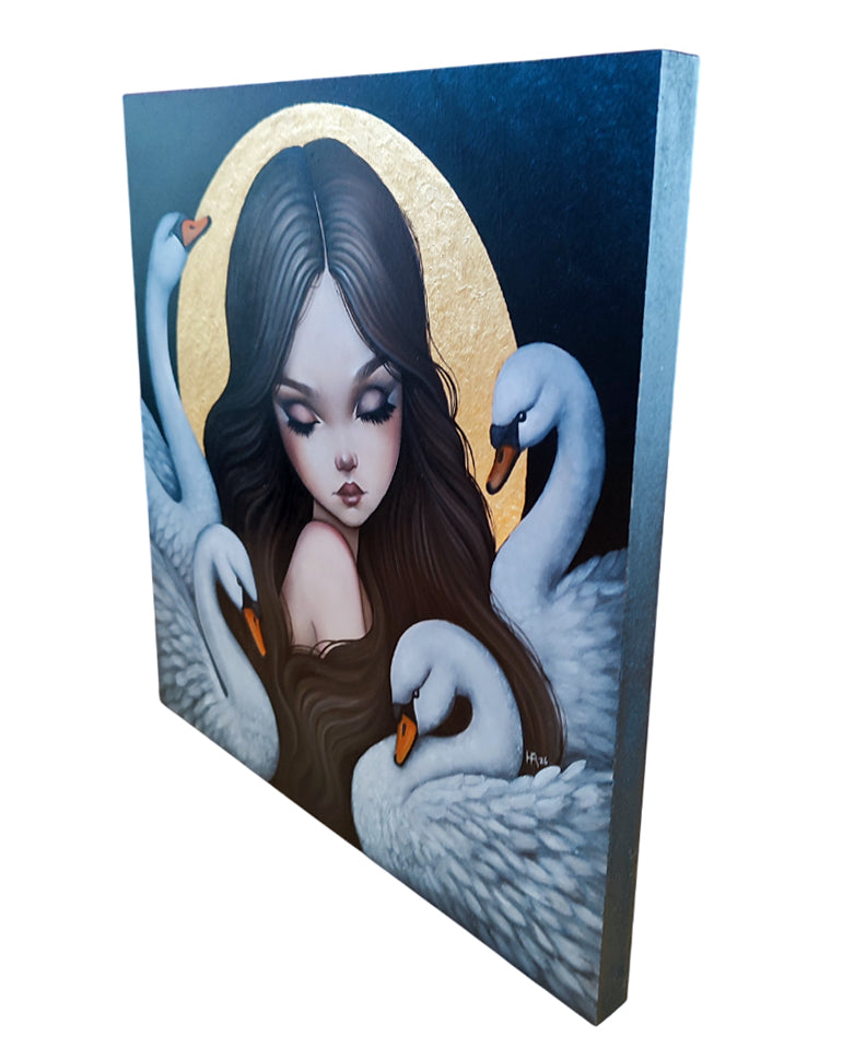Canvas print of a woman surrounded by swans with a gold moon in the background