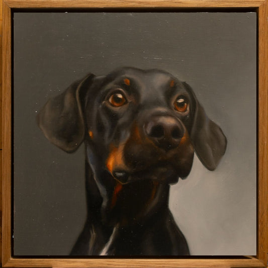 Painting of a black and brown dog with brown eyes.