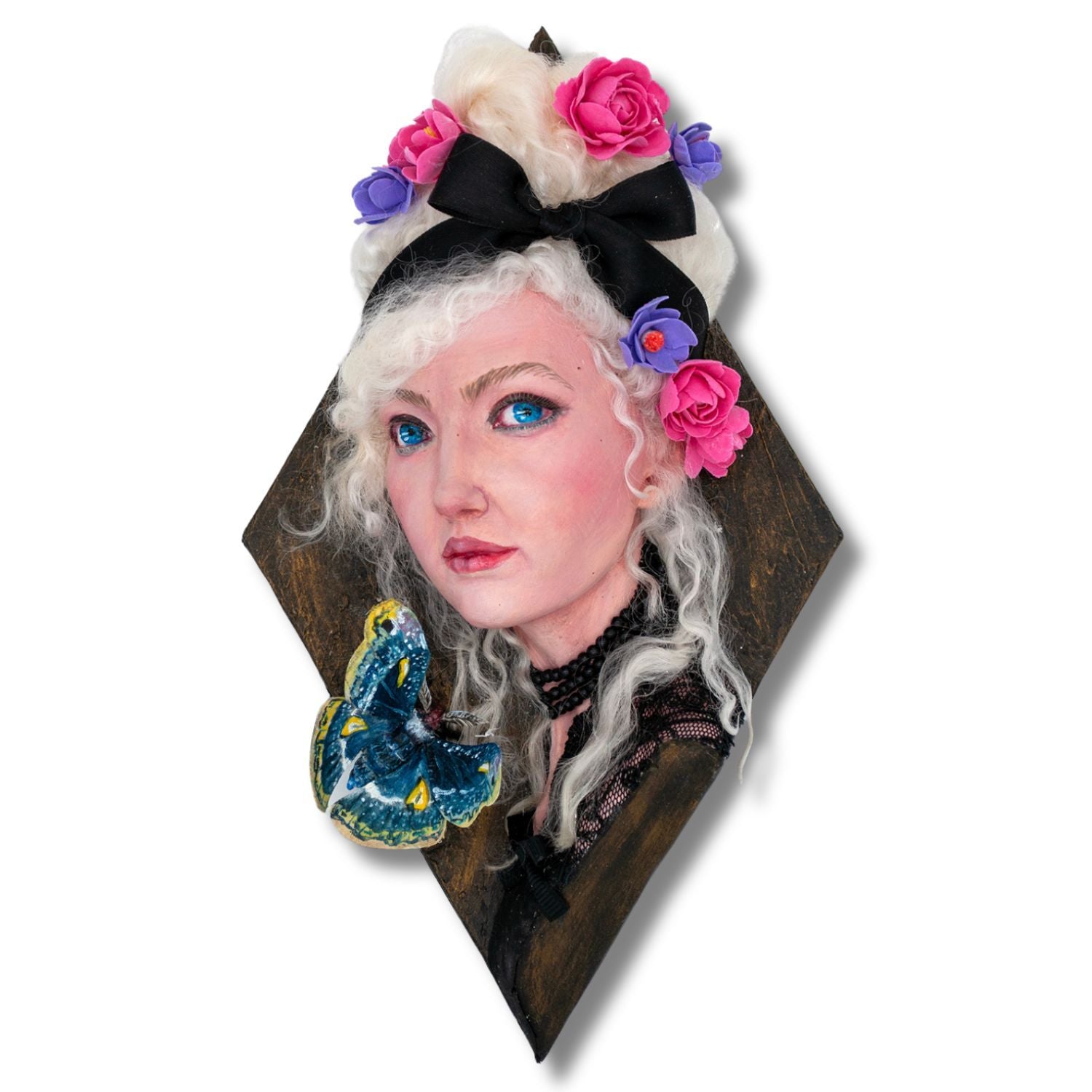 Airdry clay and mixed media sculpture of a woman with a moth