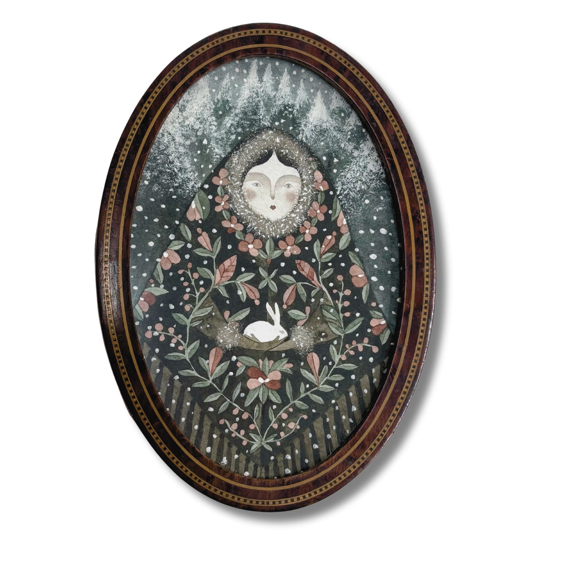 Framed oval painting of a woman in winter fur coat holding a rabbit