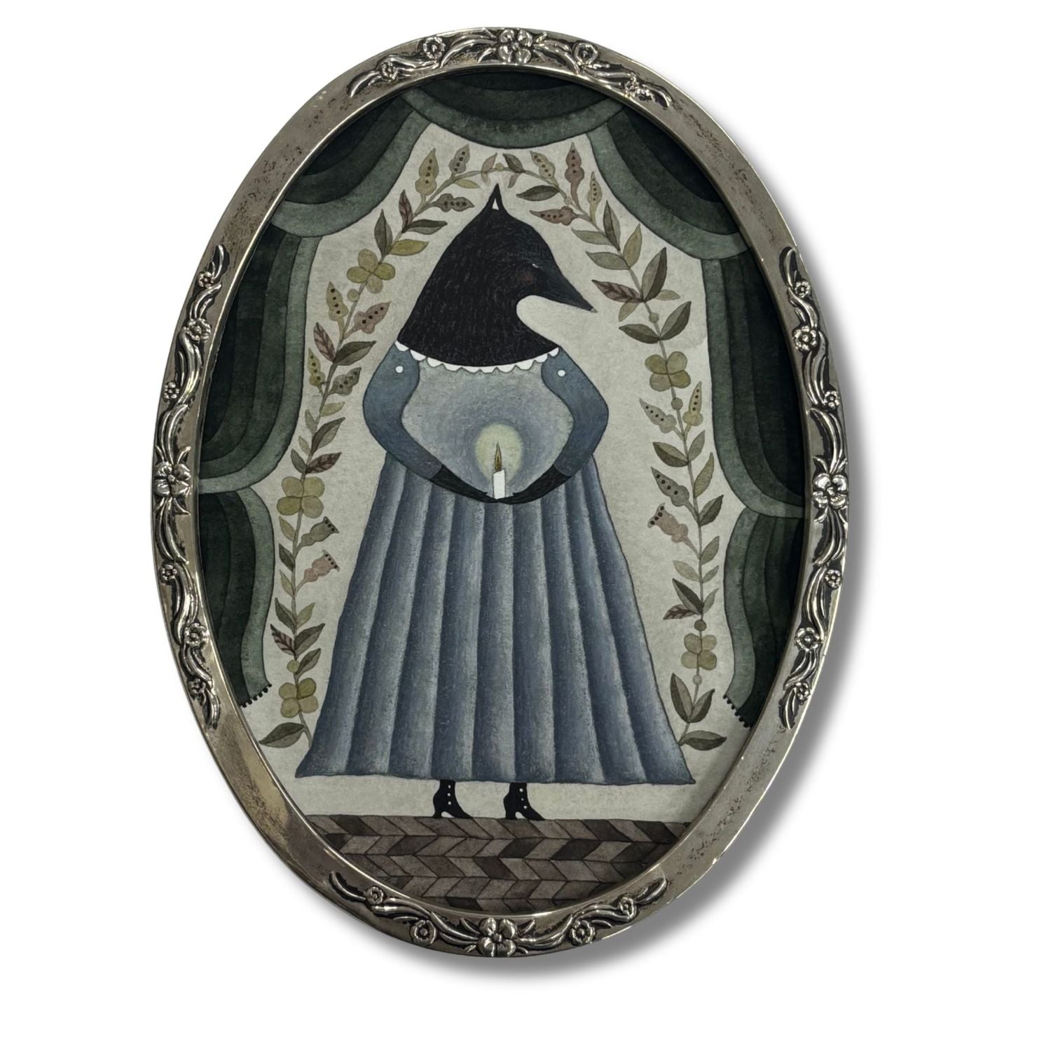 Oval silver frame featuring a watercolour illustration of a bear by Maria Gordon