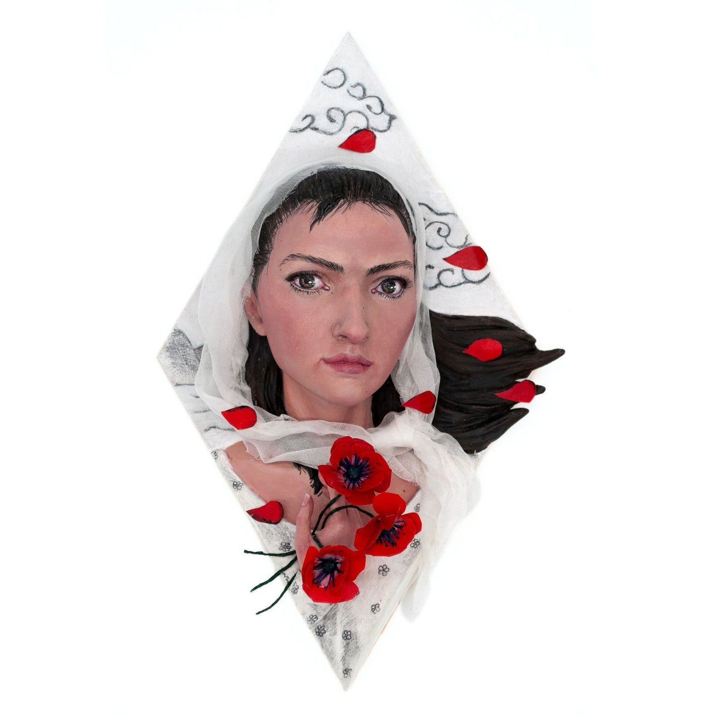 Realistic mixed media sculpture of a woman in white surrounded by poppies