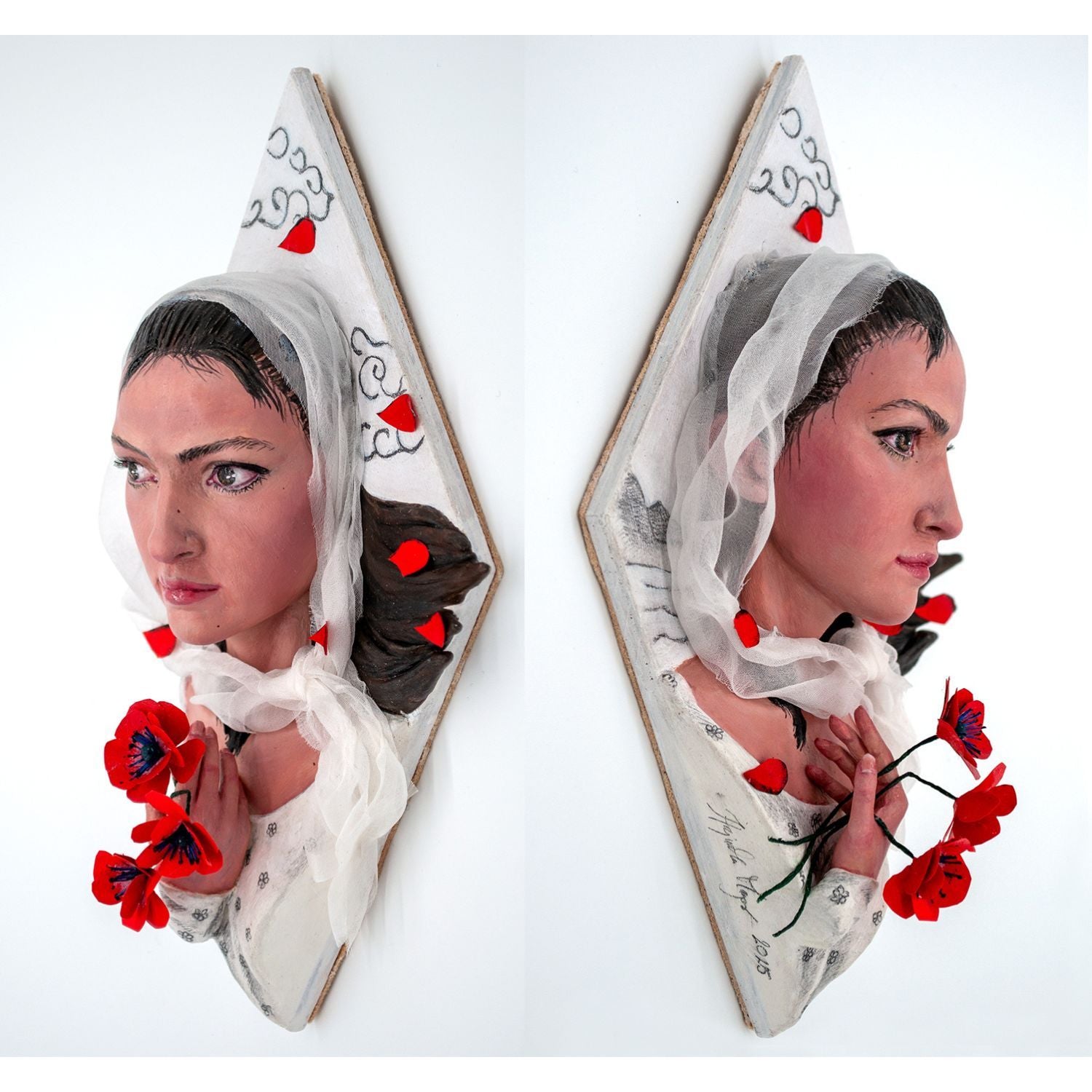 Realistic mixed media sculpture of a woman in white surrounded by poppies
