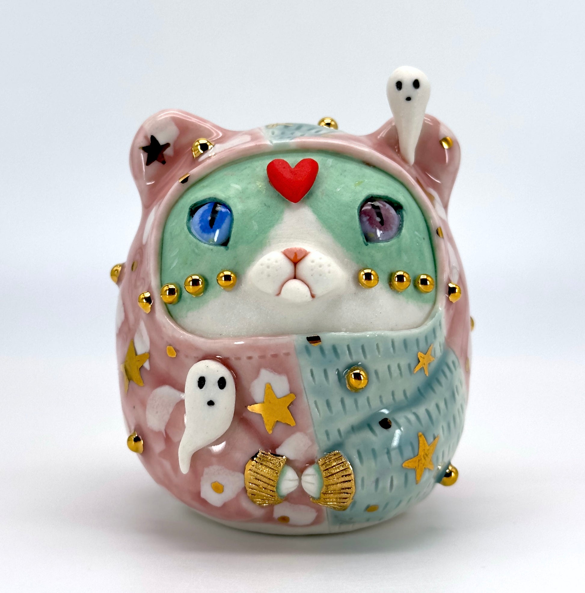 Colourful ceramic cat figurine with decorative elements by Ryoko Rio