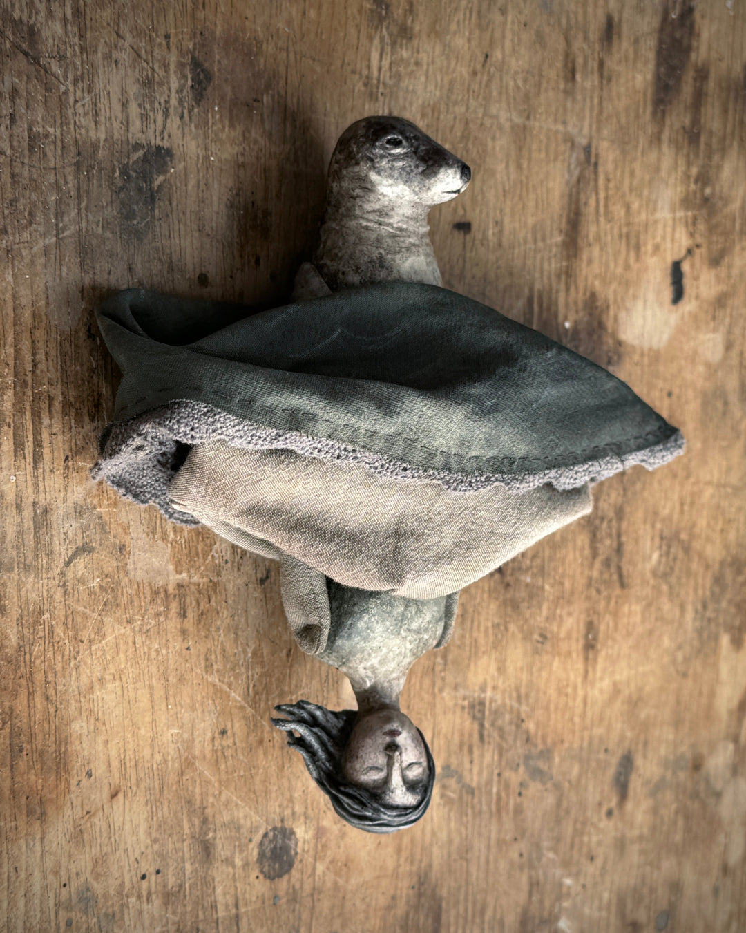 The two contrasting but joined figures of a Selkie as depicted by Anne Breymann