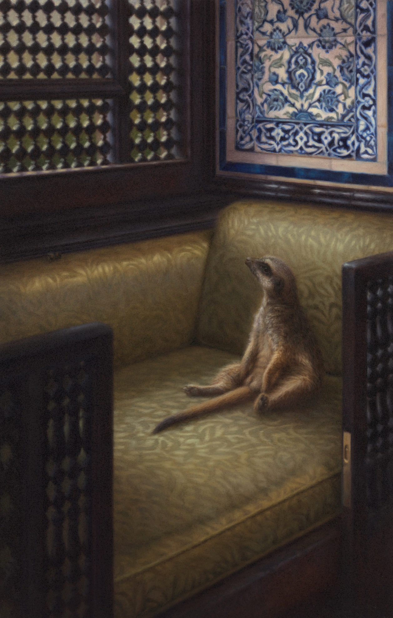 Meerkat sitting on a cushioned daybed with ornate wooden frame and mosaic in the background