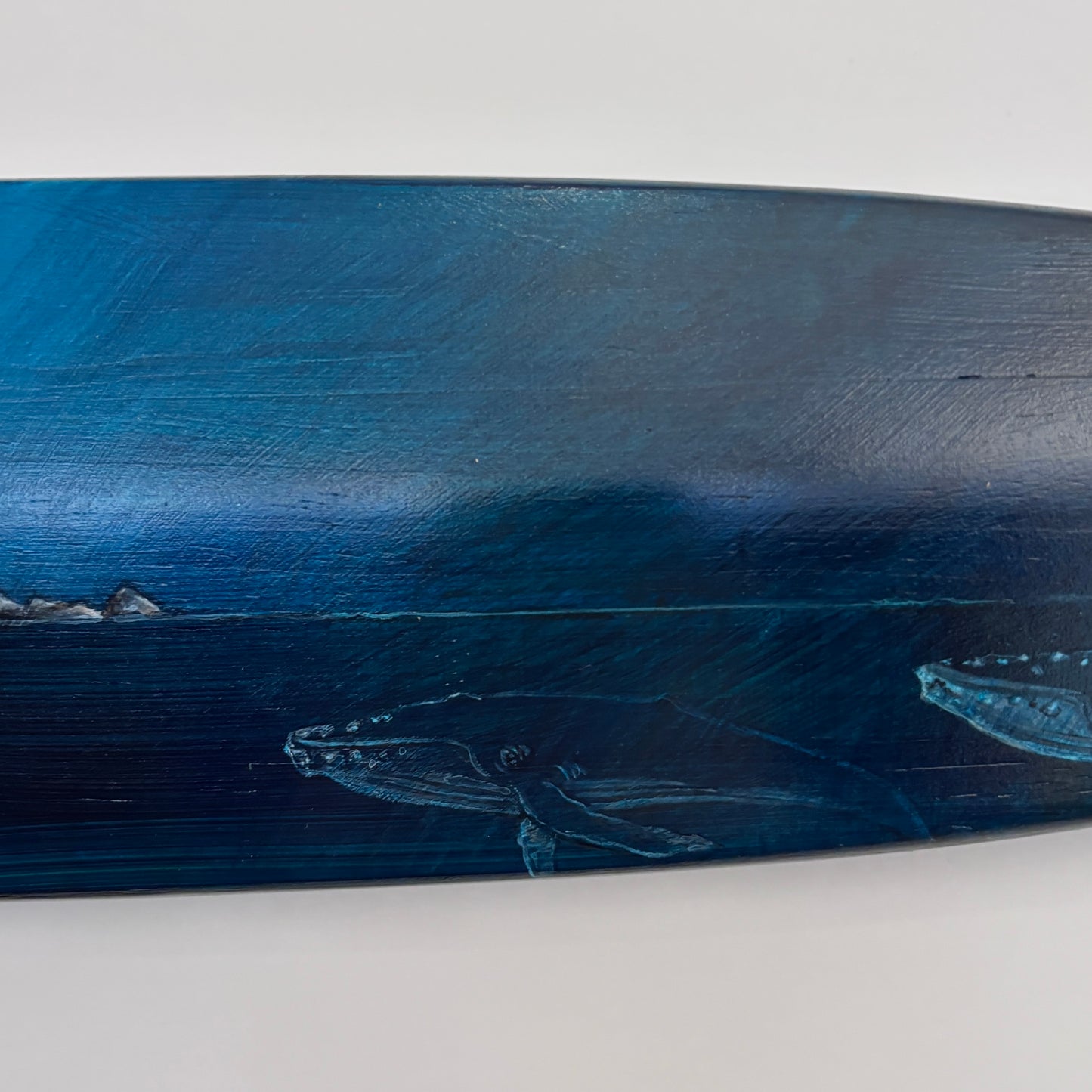 Oar with acrylic and pencil scene of a lighthouse and whales