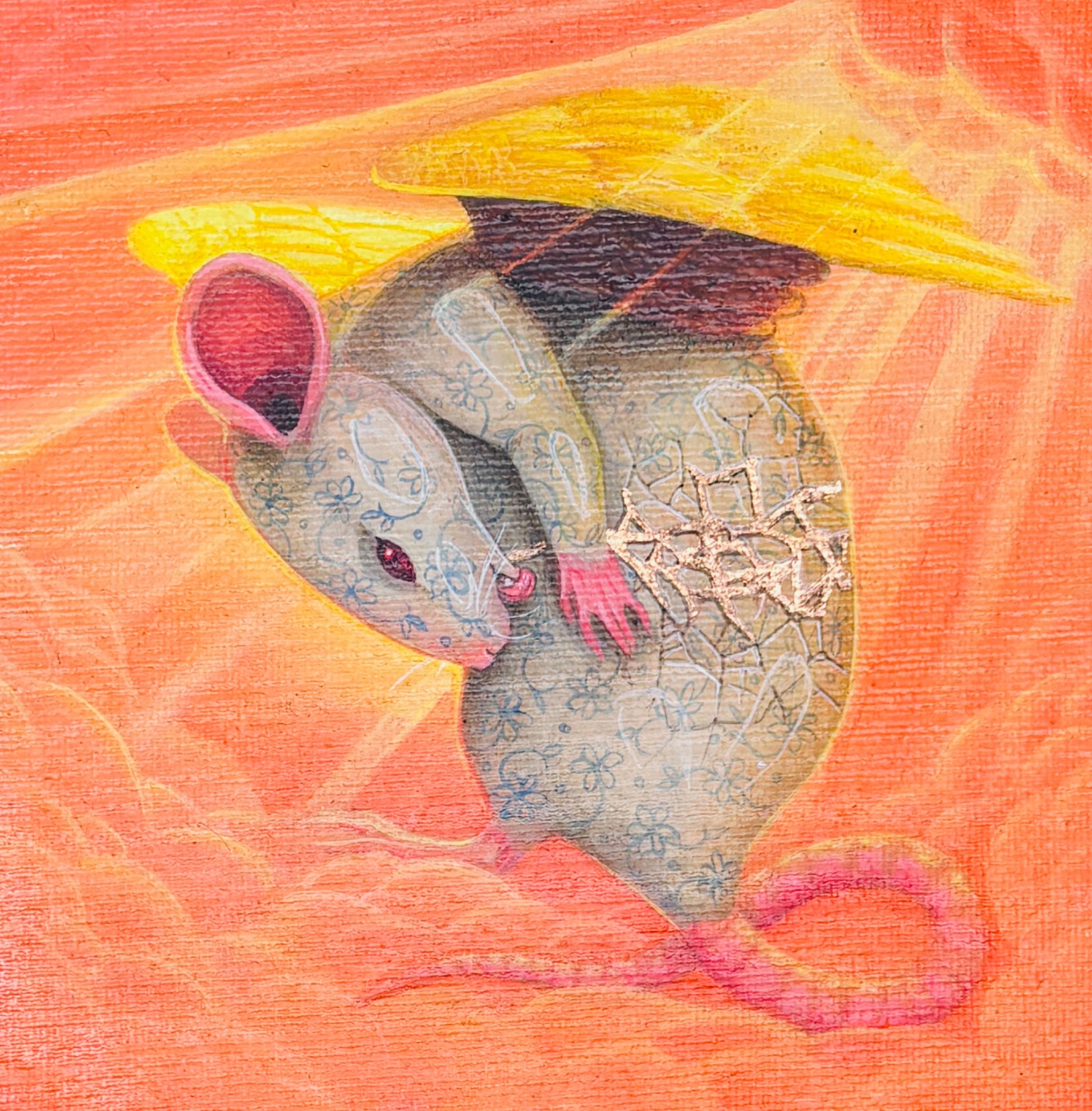 A stylised painting of a grey mouse with blue floral patterns, pink ears and tail, and yellow wings, set against a warm orange and pink background.